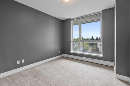 407-55 Spruce Place Sw, Calgary, AB - Indoor Photo Showing Other Room