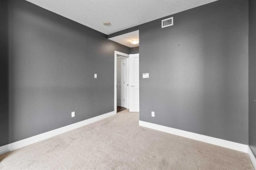 407-55 Spruce Place Sw, Calgary, AB - Indoor Photo Showing Other Room