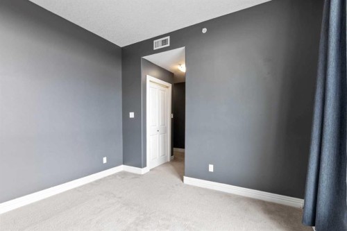 407-55 Spruce Place Sw, Calgary, AB - Indoor Photo Showing Other Room