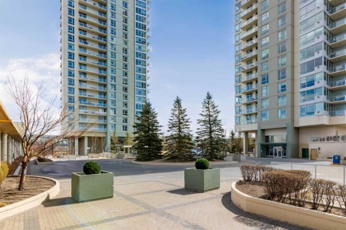 407-55 Spruce Place Sw, Calgary, AB - Outdoor With Balcony With Facade