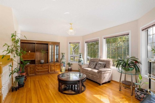 218 15 Avenue Nw, Calgary, AB - Indoor Photo Showing Living Room With Fireplace