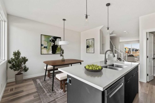 31 Setonvista Way Se, Calgary, AB - Indoor Photo Showing Kitchen With Double Sink With Upgraded Kitchen