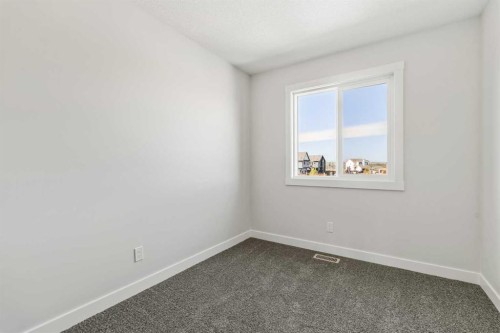 31 Setonvista Way Se, Calgary, AB - Indoor Photo Showing Other Room