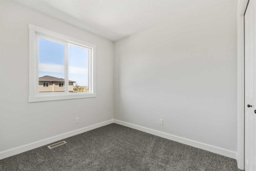 31 Setonvista Way Se, Calgary, AB - Indoor Photo Showing Other Room