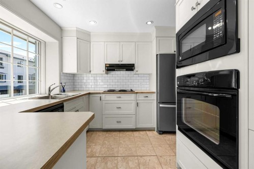 238-4037 42 Street Nw, Calgary, AB - Indoor Photo Showing Kitchen With Double Sink With Upgraded Kitchen