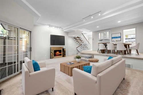 238-4037 42 Street Nw, Calgary, AB - Indoor Photo Showing Living Room With Fireplace