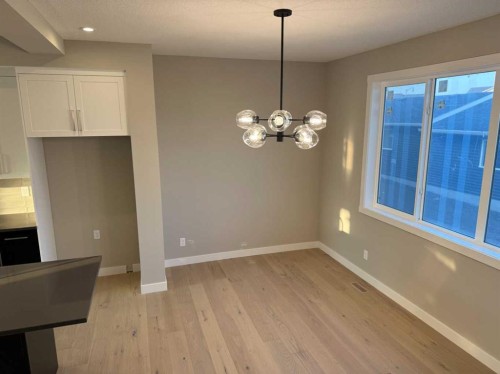 302 Sundown Road, Cochrane, AB - Indoor Photo Showing Other Room