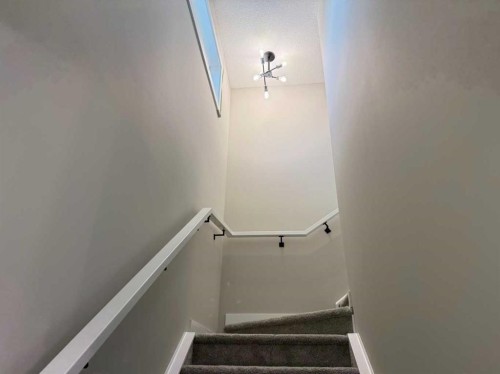 302 Sundown Road, Cochrane, AB - Indoor Photo Showing Other Room