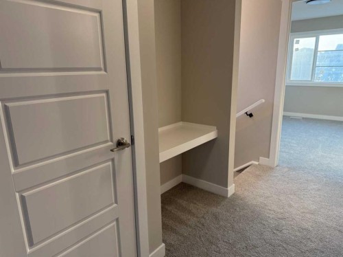 302 Sundown Road, Cochrane, AB - Indoor Photo Showing Other Room