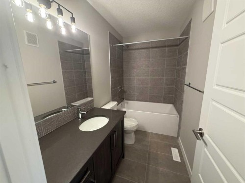 302 Sundown Road, Cochrane, AB - Indoor Photo Showing Bathroom