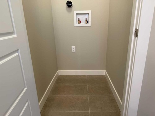 302 Sundown Road, Cochrane, AB - Indoor Photo Showing Other Room