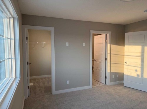 302 Sundown Road, Cochrane, AB - Indoor Photo Showing Other Room