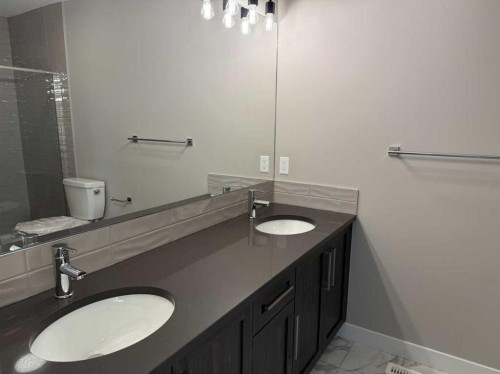 302 Sundown Road, Cochrane, AB - Indoor Photo Showing Bathroom