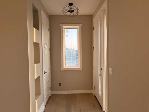 302 Sundown Road, Cochrane, AB - Indoor Photo Showing Other Room