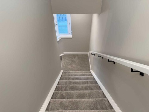 302 Sundown Road, Cochrane, AB - Indoor Photo Showing Other Room