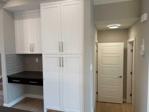 302 Sundown Road, Cochrane, AB - Indoor Photo Showing Other Room