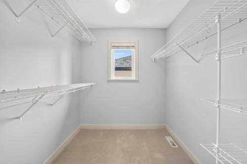 46 Valley Ponds Way Nw, Calgary, AB - Indoor With Storage