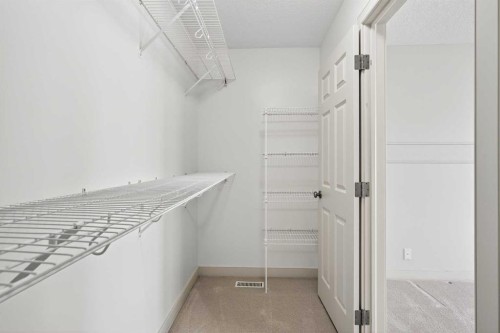 46 Valley Ponds Way Nw, Calgary, AB - Indoor With Storage