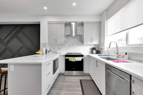 117 Ambleton Drive Nw, Calgary, AB - Indoor Photo Showing Kitchen With Upgraded Kitchen