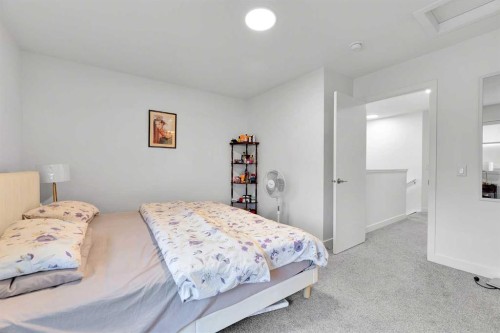 117 Ambleton Drive Nw, Calgary, AB - Indoor Photo Showing Bedroom
