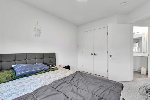 117 Ambleton Drive Nw, Calgary, AB - Indoor Photo Showing Bedroom