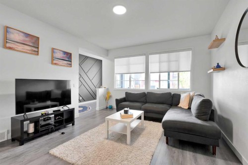 117 Ambleton Drive Nw, Calgary, AB - Indoor Photo Showing Living Room