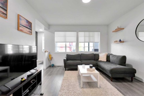 117 Ambleton Drive Nw, Calgary, AB - Indoor Photo Showing Living Room