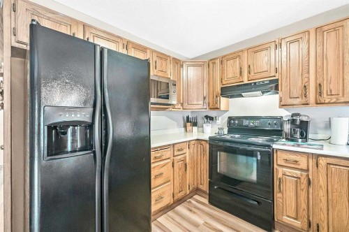 36 Millside Way Sw, Calgary, AB - Indoor Photo Showing Kitchen