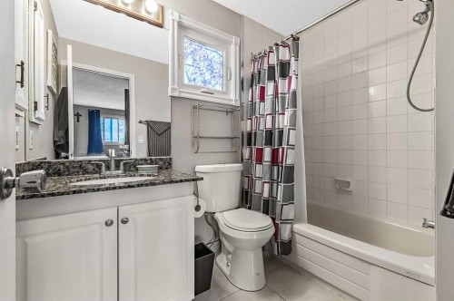 36 Millside Way Sw, Calgary, AB - Indoor Photo Showing Bathroom