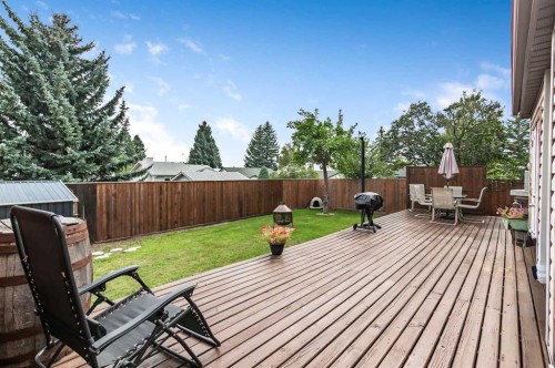 36 Millside Way Sw, Calgary, AB - Outdoor With Deck Patio Veranda