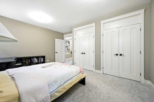 16 Spring Valley Lane Sw, Calgary, AB - Indoor Photo Showing Bedroom