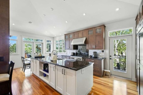 16 Spring Valley Lane Sw, Calgary, AB - Indoor Photo Showing Kitchen With Upgraded Kitchen