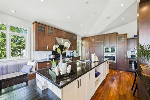 16 Spring Valley Lane Sw, Calgary, AB - Indoor Photo Showing Kitchen With Upgraded Kitchen