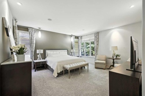 16 Spring Valley Lane Sw, Calgary, AB - Indoor Photo Showing Bedroom