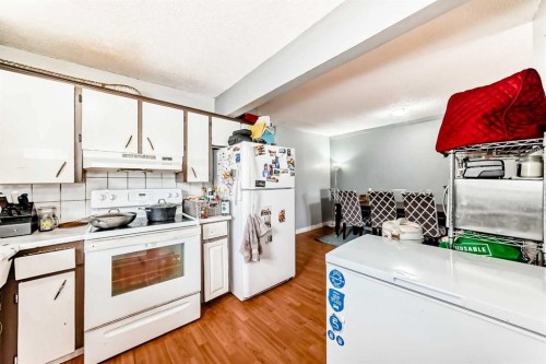 203 Penbrooke Close Se, Calgary, AB - Indoor Photo Showing Kitchen