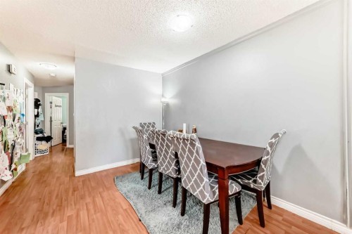 203 Penbrooke Close Se, Calgary, AB - Indoor Photo Showing Dining Room