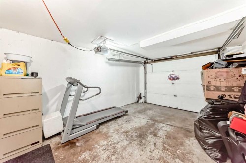 203 Penbrooke Close Se, Calgary, AB - Indoor Photo Showing Garage