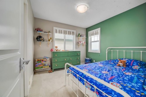593 Nolan Hill Boulevard Nw, Calgary, AB - Indoor Photo Showing Bedroom