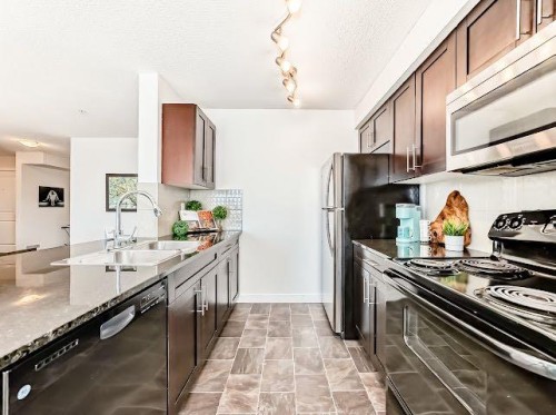 2340-81 Legacy Boulevard Se, Calgary, AB - Indoor Photo Showing Kitchen With Upgraded Kitchen