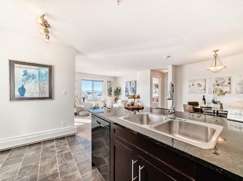 2340-81 Legacy Boulevard Se, Calgary, AB - Indoor Photo Showing Kitchen With Double Sink