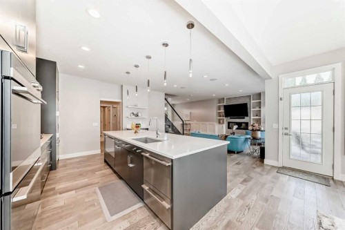 213 Springbluff Boulevard Sw, Calgary, AB - Indoor Photo Showing Kitchen With Upgraded Kitchen