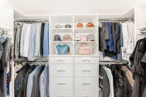 213 Springbluff Boulevard Sw, Calgary, AB - Indoor With Storage