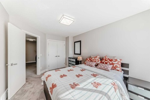 213 Springbluff Boulevard Sw, Calgary, AB - Indoor Photo Showing Bedroom