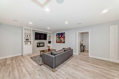 213 Springbluff Boulevard Sw, Calgary, AB - Indoor With Fireplace