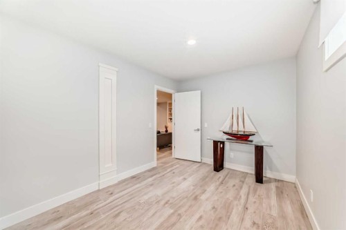 213 Springbluff Boulevard Sw, Calgary, AB - Indoor Photo Showing Other Room