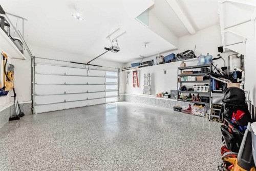 213 Springbluff Boulevard Sw, Calgary, AB - Indoor Photo Showing Garage