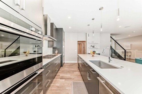 213 Springbluff Boulevard Sw, Calgary, AB - Indoor Photo Showing Kitchen With Upgraded Kitchen