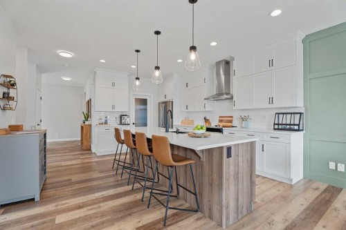 57 Ranchers Way, Okotoks, AB - Indoor Photo Showing Kitchen With Upgraded Kitchen