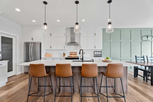 57 Ranchers Way, Okotoks, AB - Indoor Photo Showing Kitchen With Upgraded Kitchen