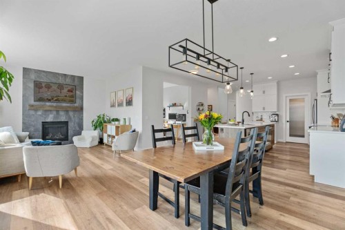 57 Ranchers Way, Okotoks, AB - Indoor Photo Showing Other Room With Fireplace